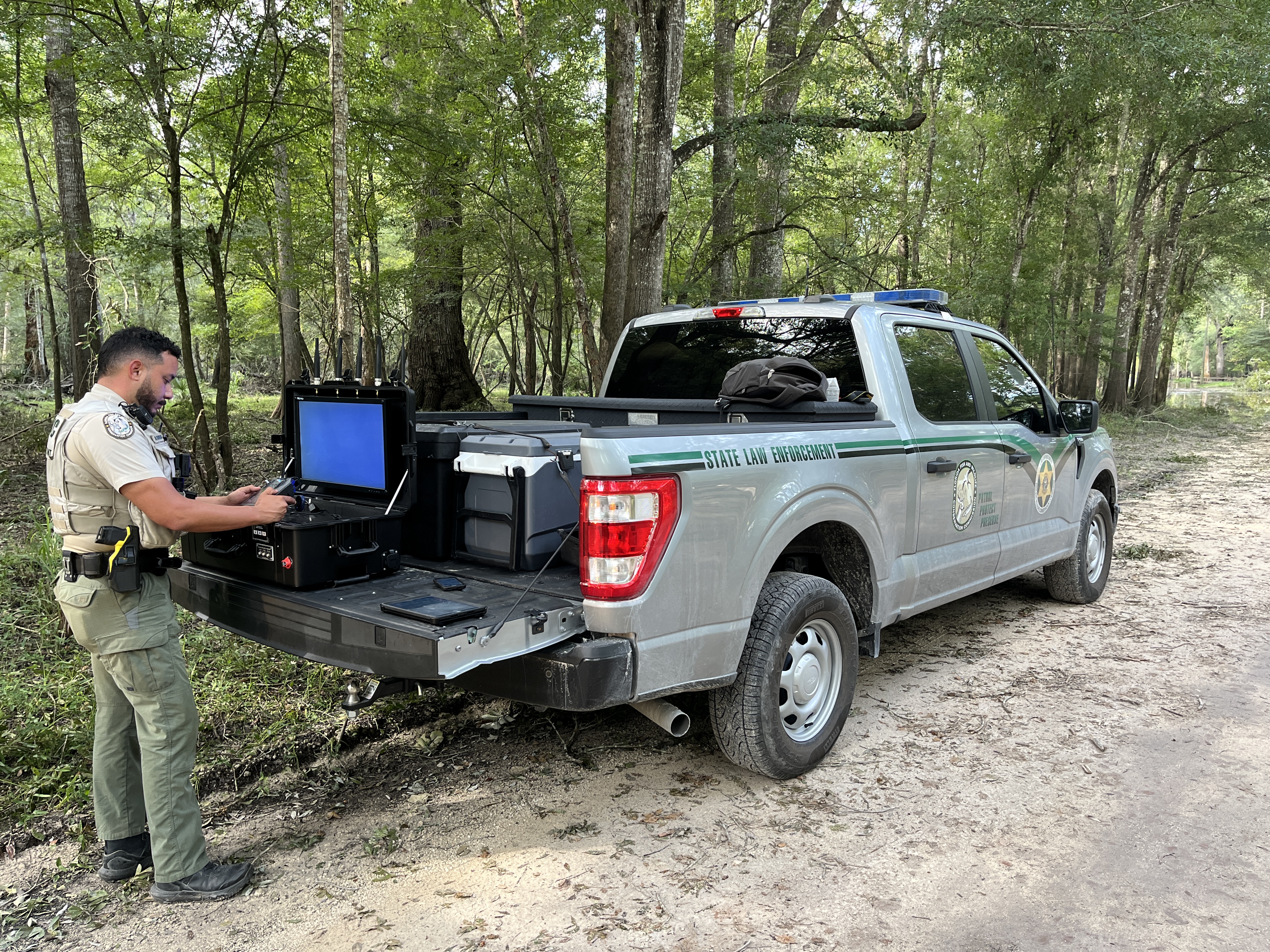 Law enforcement officer operating a drone for public safety operations